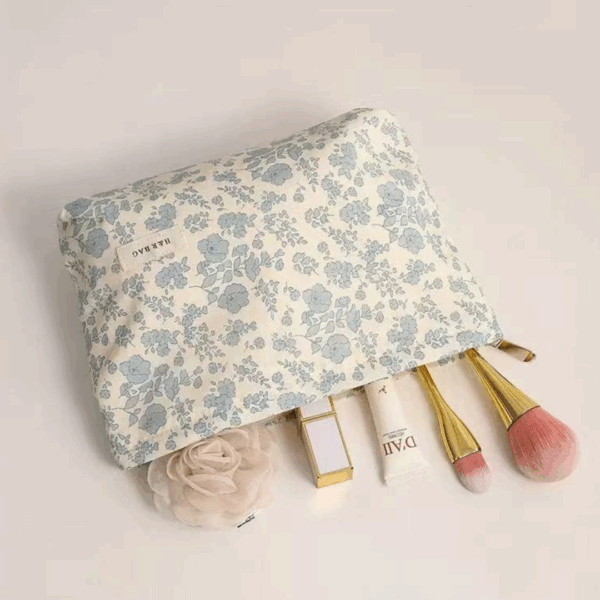 large blue cosmetic bag