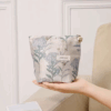 small blue cosmetic bag