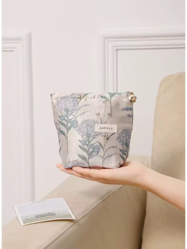 small cosmetic bag with blue floral print