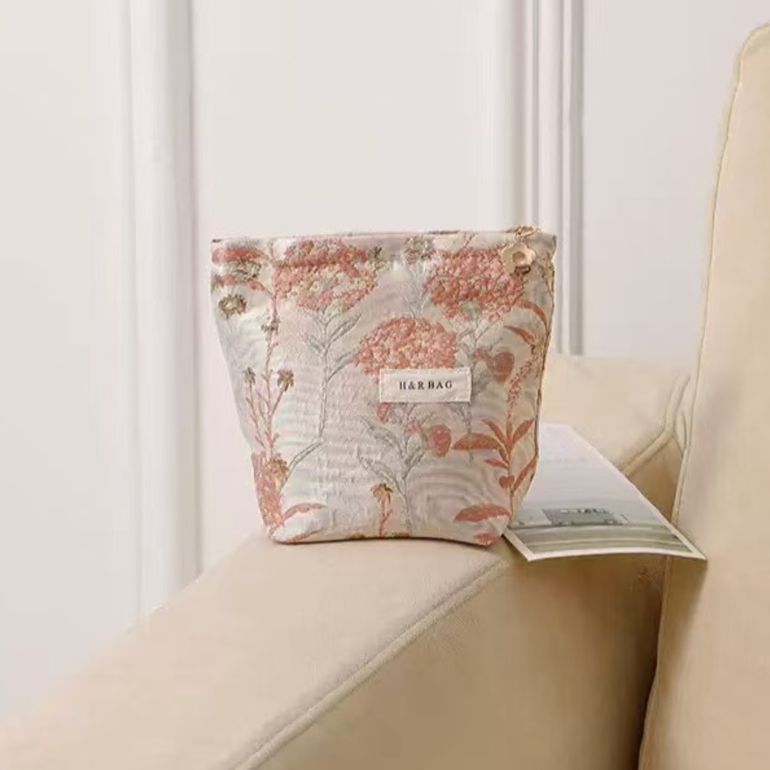 small pink cosmetic bag